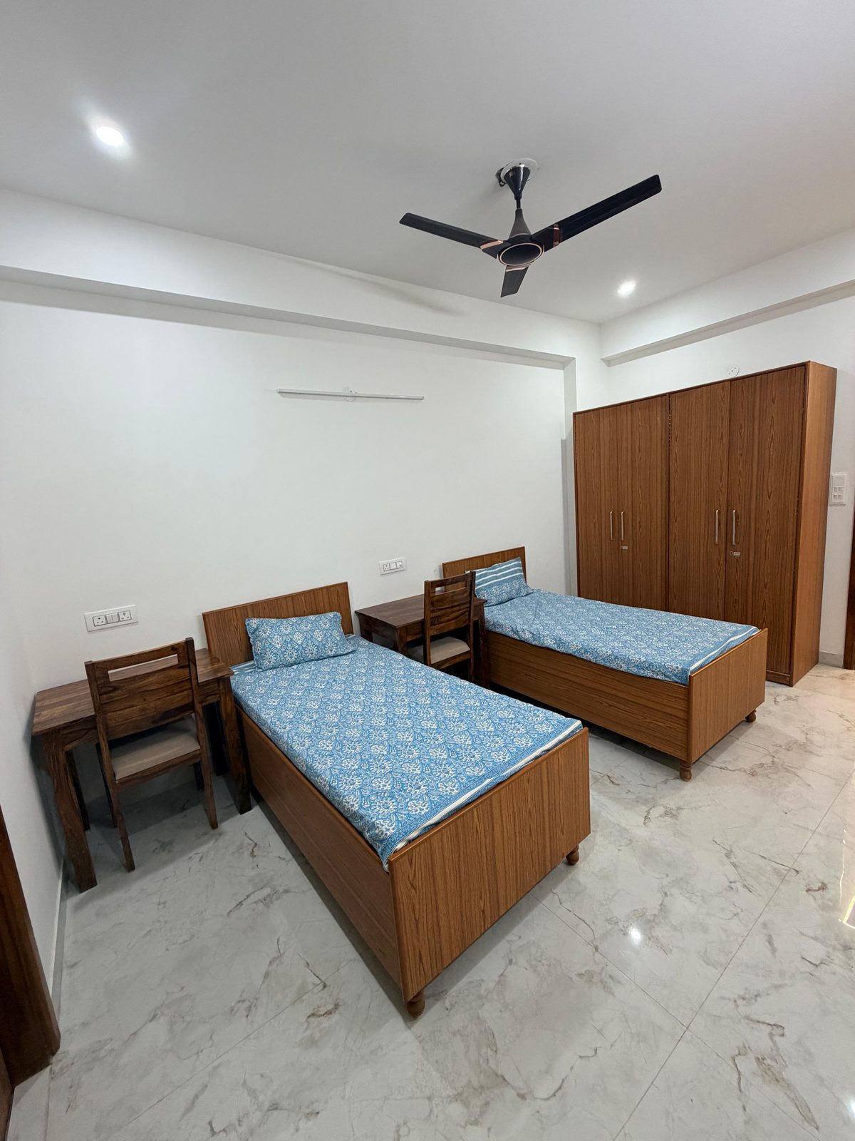 Furnished twin room with wardrobe at Tri-Homes L-10